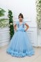 Blue Princess-Style Girls' Formal Dress with Ruffed Shoulders and Glittery Print