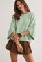 Gülseli Crew Neck Knit Sweater with Button Detail.