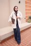 قبعة بغطاء للرأس وجيوب وسحاب. - 2