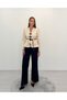 Avelina Belted Blazer with Belt Detail and Contrast Trimming, Paired with Pants—Cream and Navy Suit