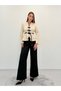 Avelina Belted Blazer with Belt Detail and Contrast Trims, Paired with Pants—Cream and Black Suit - 5