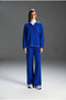 Women's Oversized Knit Sweater with a Turtleneck and Contrast Black Seam Detail, Paired with Wide-Leg Pants Set