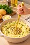 Gold-Colored Stainless Steel Potato Masher—Kitchen Food Preparation and Mashing Tool