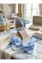 Evening dress shoes with a blue bow detail, glittery sand color, and a single-strap heel - 3