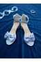 Evening dress shoes with a blue bow detail, glittery sand color, and a single-strap heel - 5