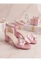 Evening dress shoes with a single strap, a pink bow detail, and a glittery sand-colored heel - 5