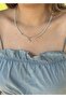 Women's eye shaped sand bead necklace