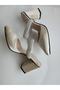 Women's gold satin stone platform heels