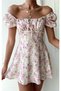 Light Yellow Dress with Tie-Neck Collar and Rose Pattern