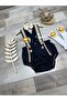Safari concept lion figure dark blue baby boy 1 year old sundress