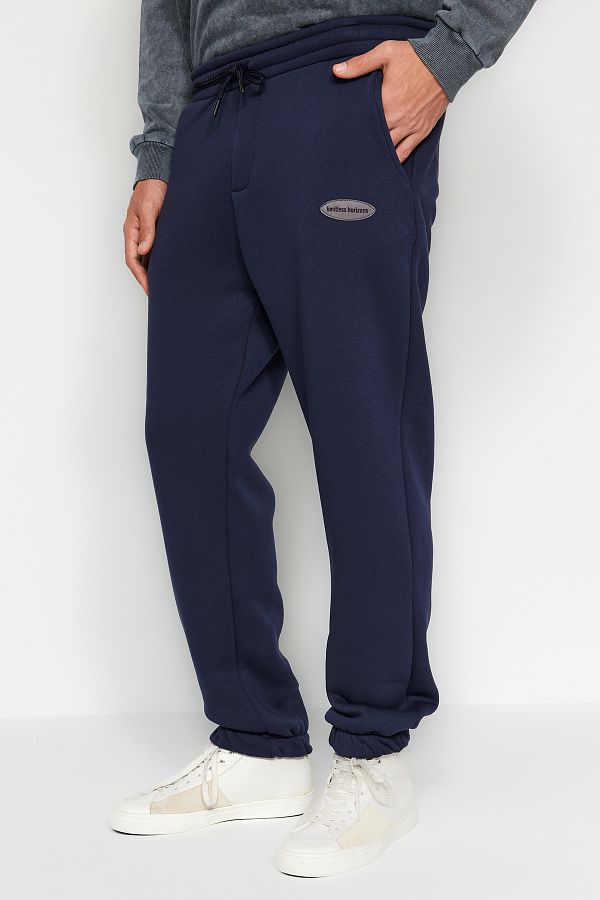Trendyol Collection-Marineblaue Oversize-Jogger-Jogginghose – Handytasche, mit Etikett TMNAW24EA00015 1