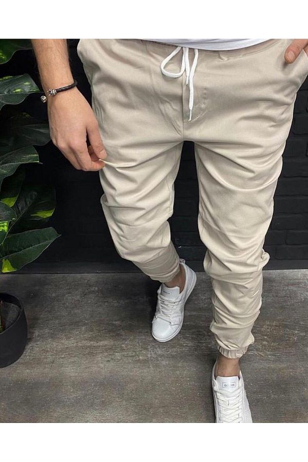 Cream jogging pants online
