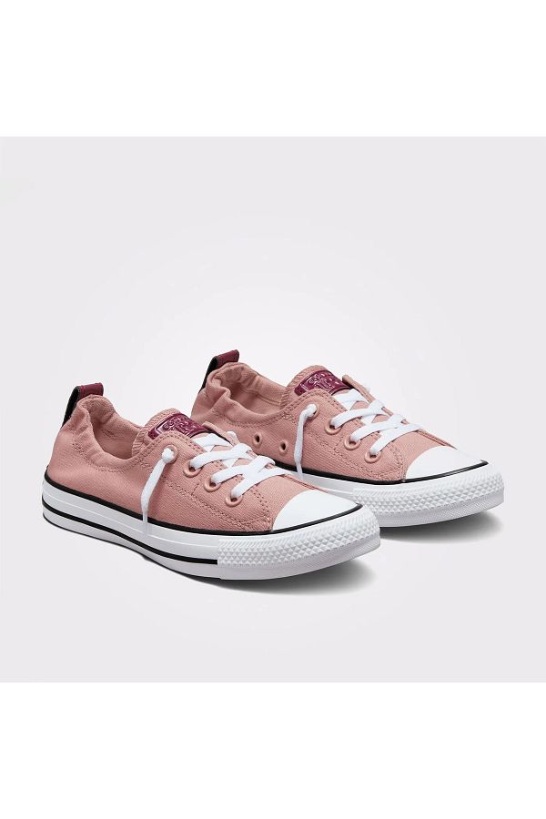 Pink slip on converse top