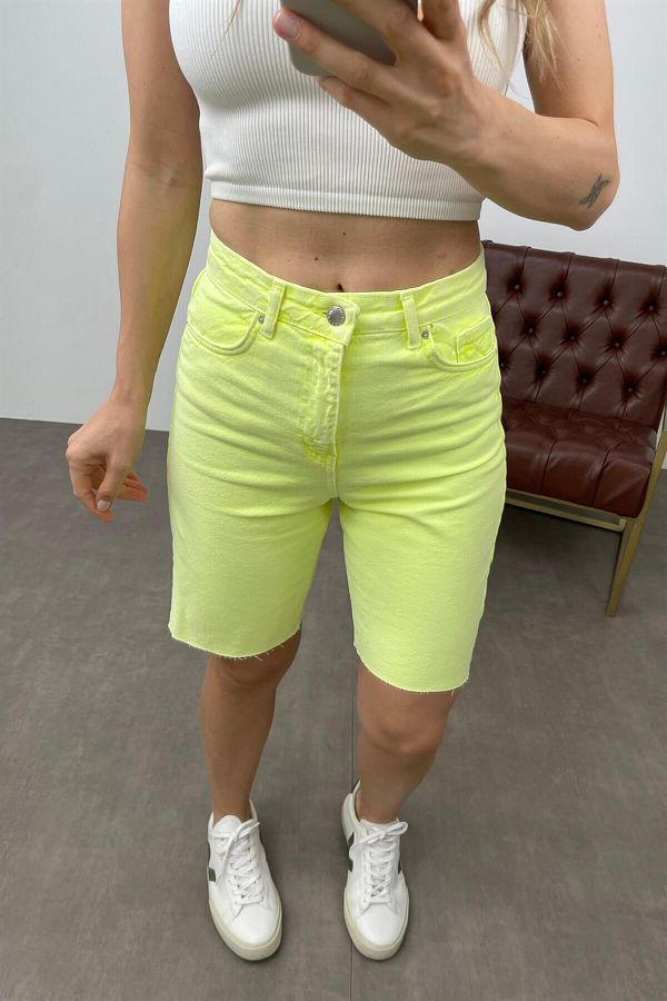 Neon yellow denim shorts store