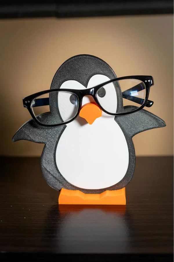 Penguin glasses holder shop