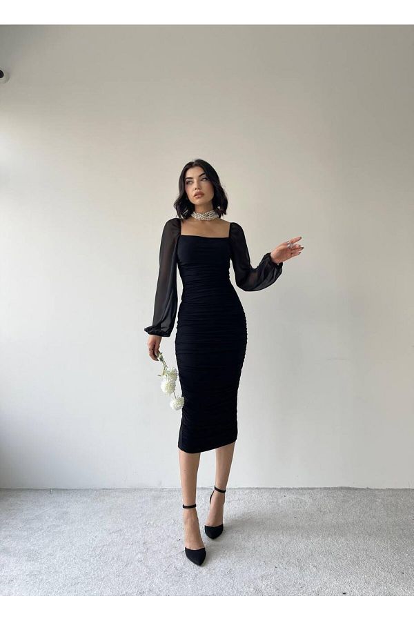 Laren Black elegant pencil dress with transparent sleeves Trendyol