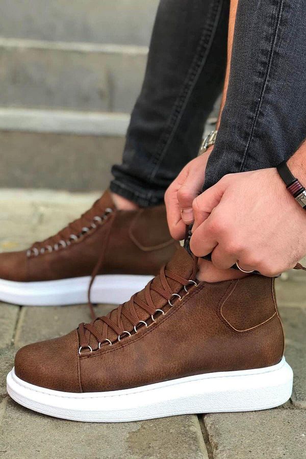 Tan boots white sole top