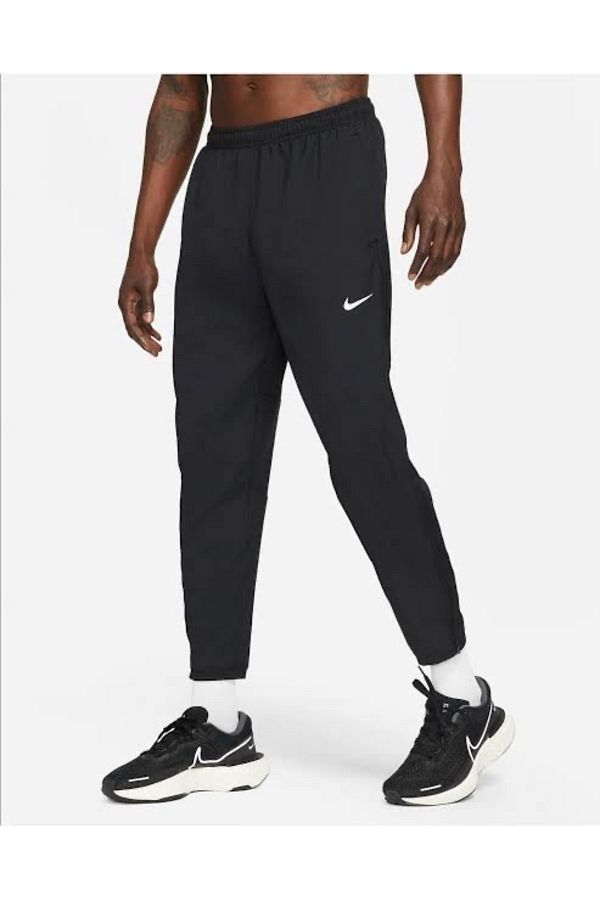 Nike Men s Dri Fit UV Challenger Woven Hybrid Running Sweatpants Trendyol