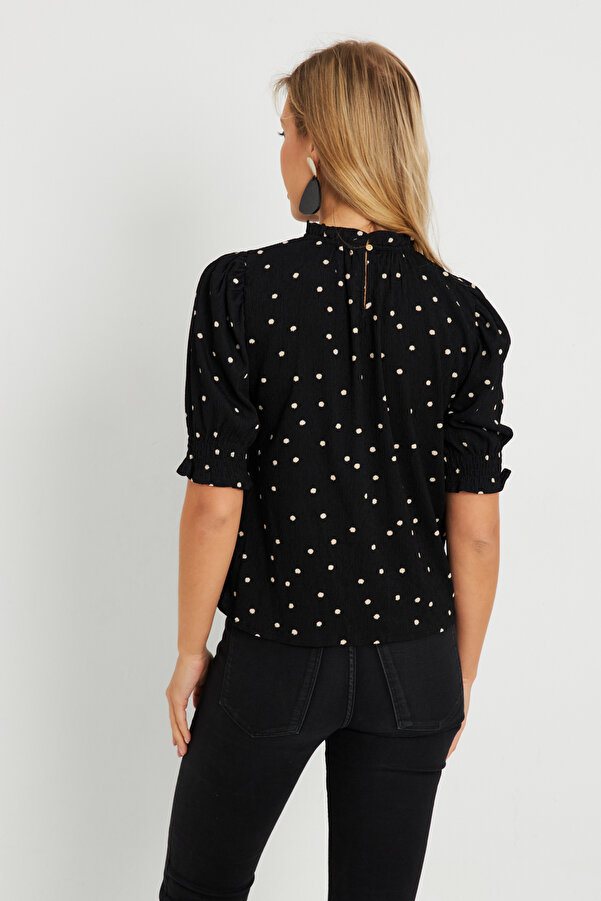 Bluse mit punkten schwarz clearance