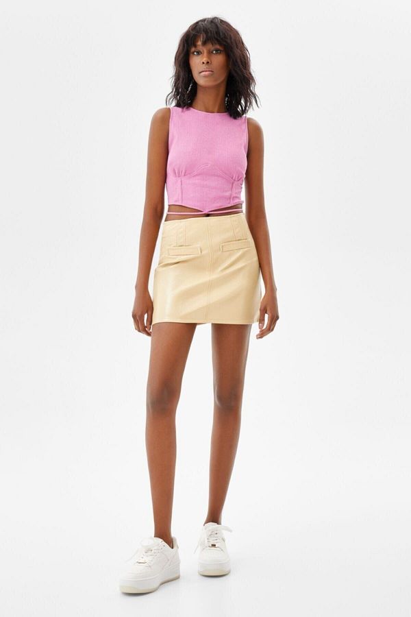 Faux vinyl skirt with belt clearance