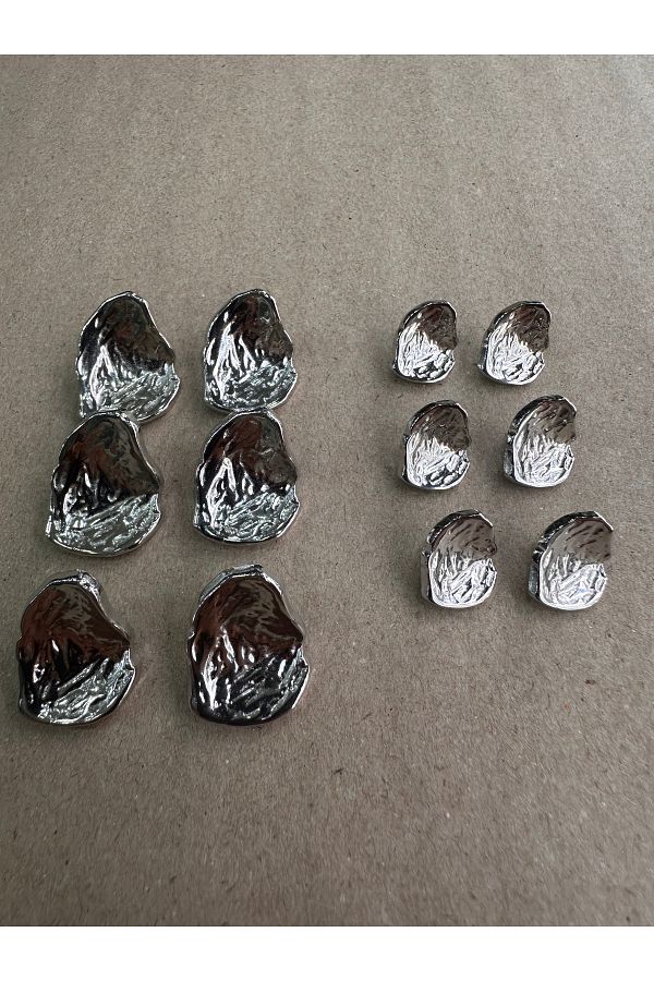 ODDA TASARIM ATÖLYESİ-Asymmetric cambered shell model silver button set 1