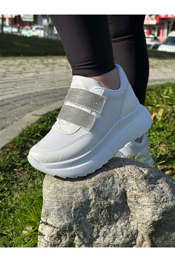 White shiny sneakers store