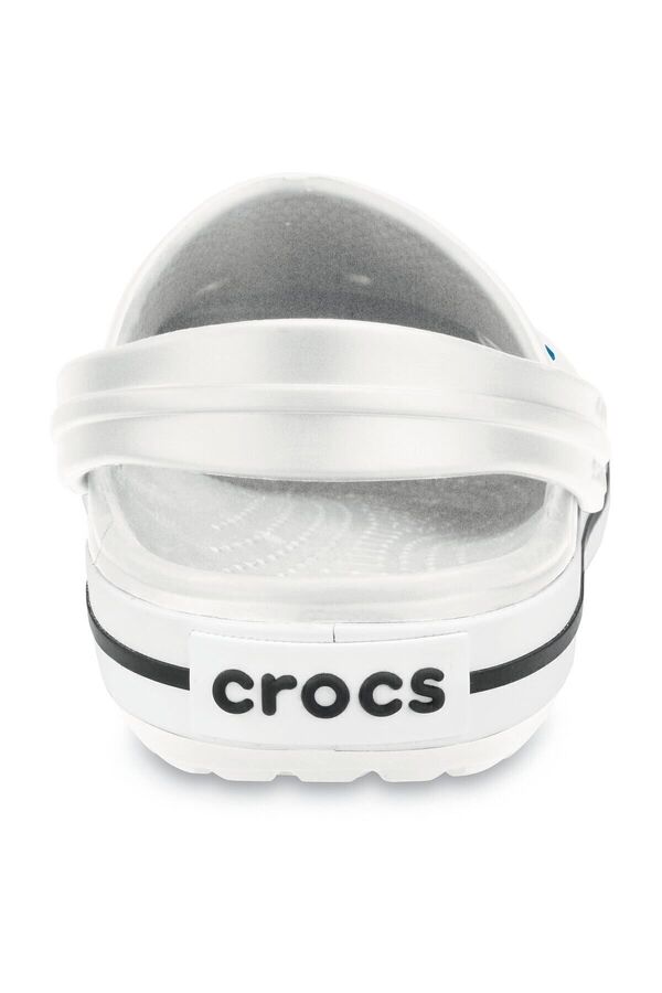 white crocs with black stripe