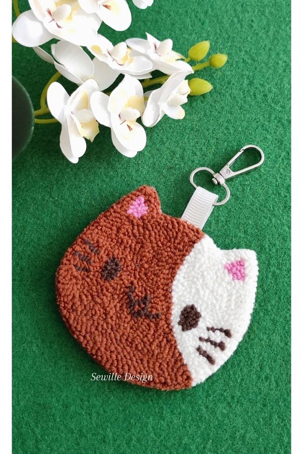 Cat punch keychain deals