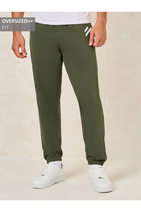 Styli-Minimal Print Oversized Joggers with Elasticated Hem 1