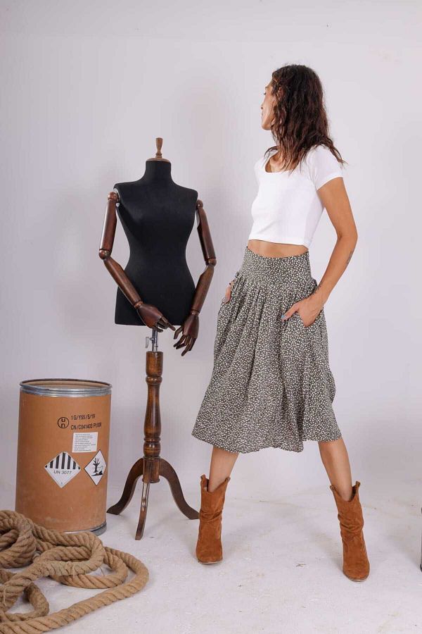 cad butik women s green floral print midi skirt with pockets Trendyol