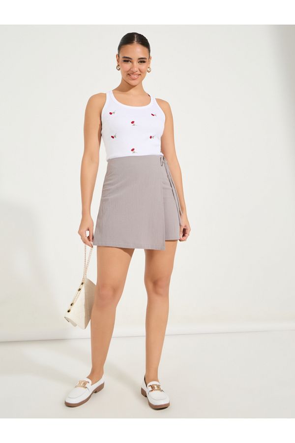 Styli-Solid Wrap Front Skort with Side Tie Up Detail 1