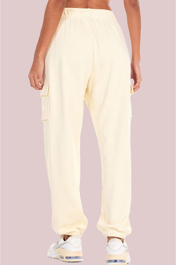 Cream colored nike sweatpants online