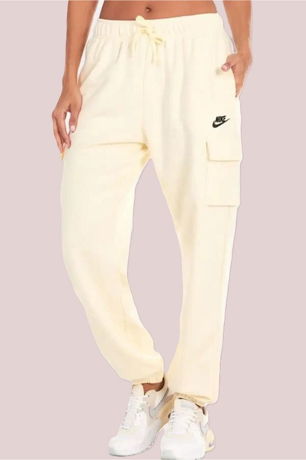 Cream colored nike sweatpants 2025