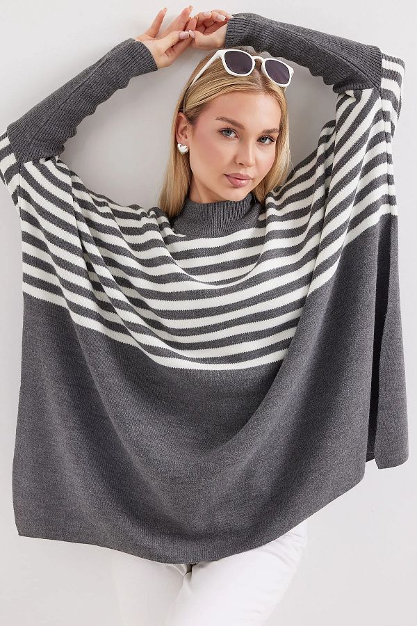 Striped poncho sweater on sale