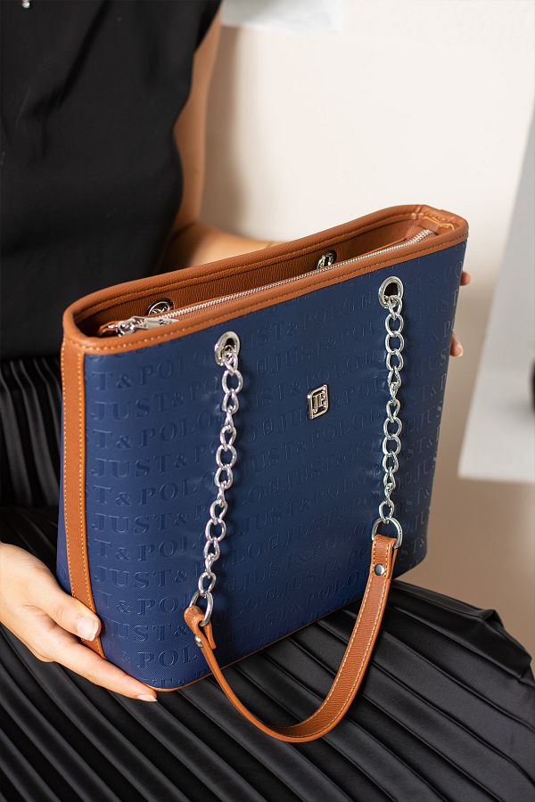 Crossbody bag with embossed chain outlet