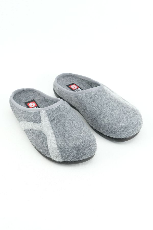 Slipper with removable sole top