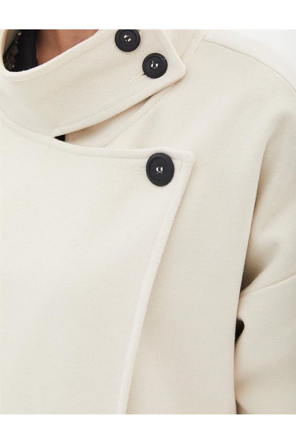 Kayra Cream Colored Asymmetrical Buttoned Stand Collar Coat Trendyol