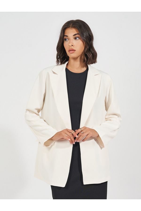 Rolled up blazer top