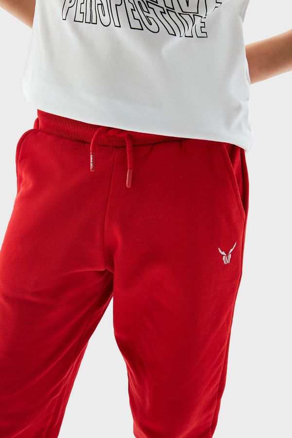 Red sweatpants in store on sale