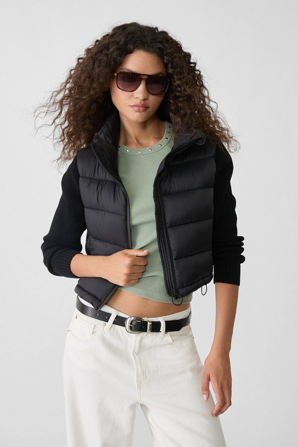 Stradivarius Puffer jacket with chunky knit sleeves Trendyol