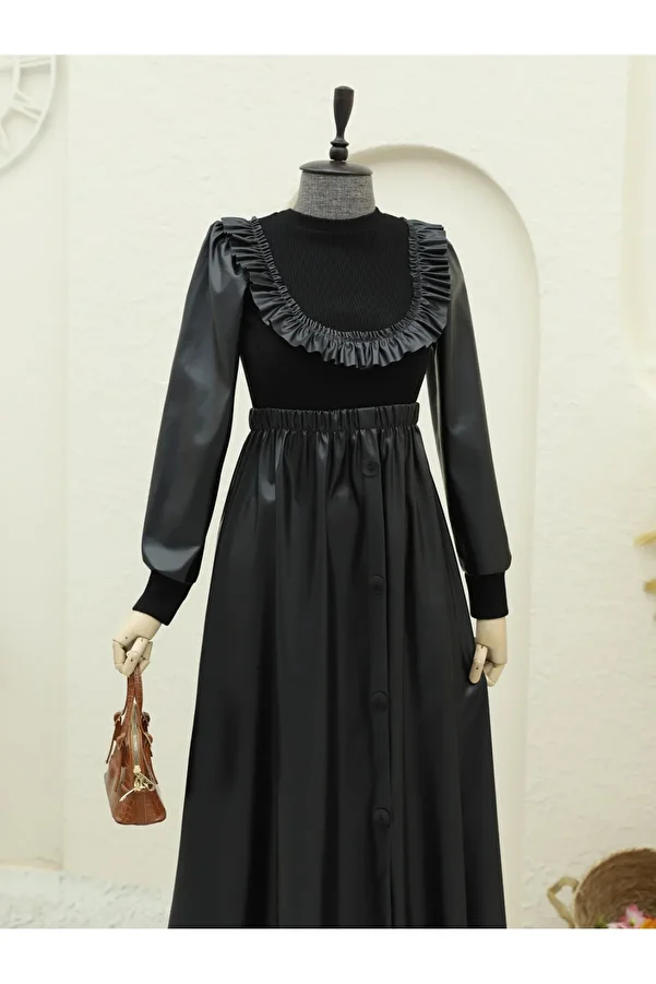Modamorfo-Lederkleid mit Rüschen vorne und Strickdetail – Schwarz 1