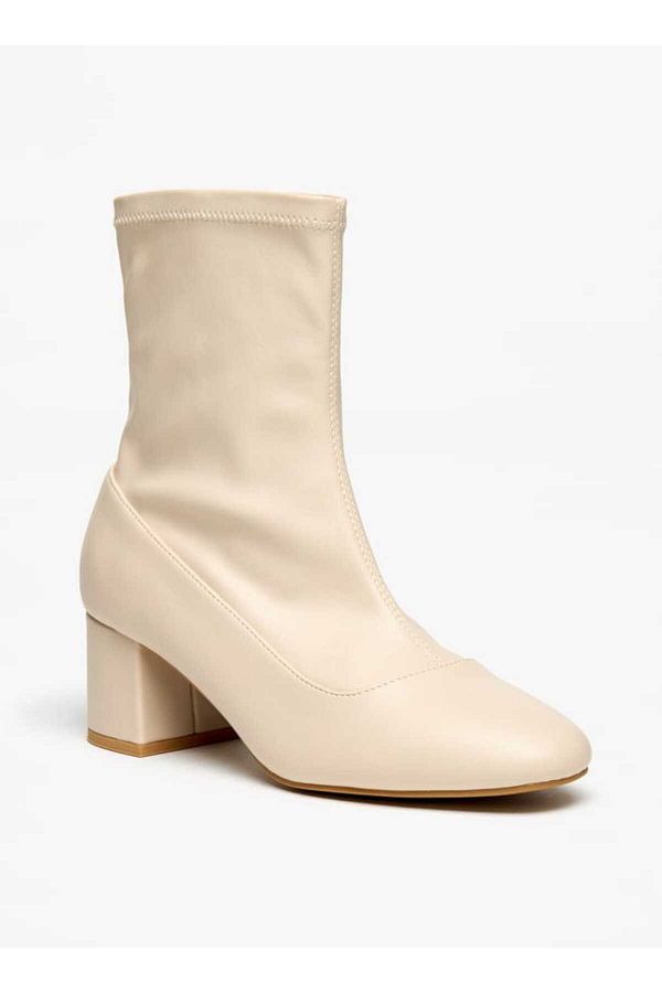 Flora Bella by Shoexpress-Flora Bella Solid Slip-On Ankle Boots with Block Heels 1