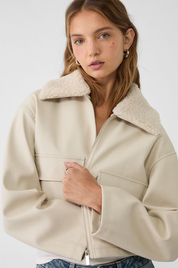 Stradivarius Faux shearling jacket with pockets Trendyol