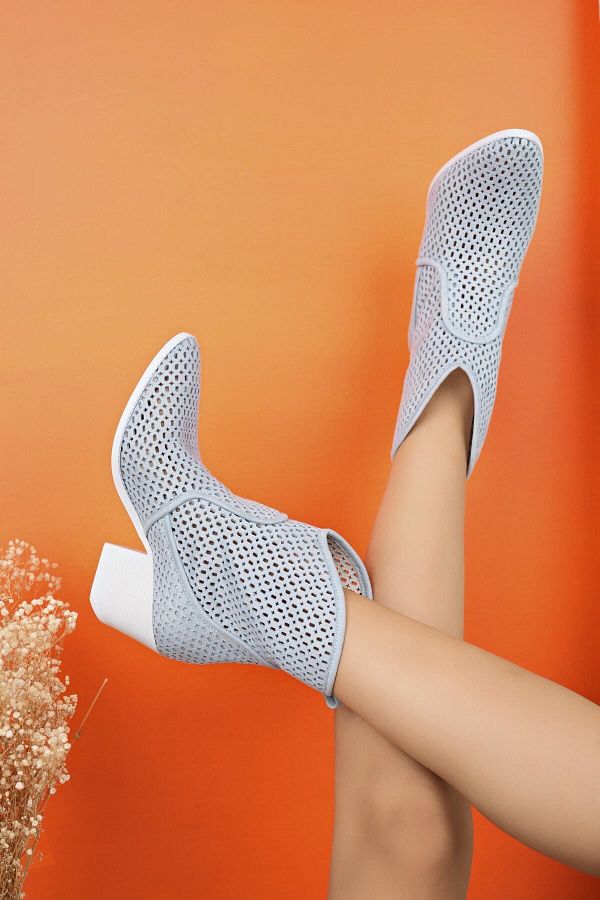 Suede perforated booties on sale