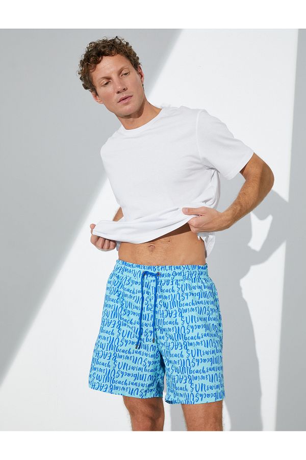 Koton-Swim shorts with text print, lacing at the waist and pockets 1