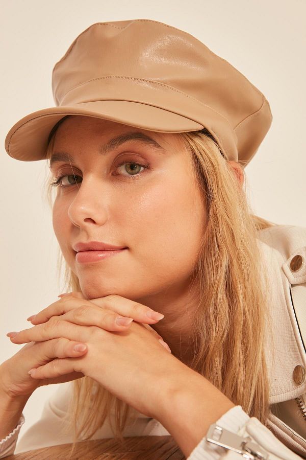 Beige leather cap sales