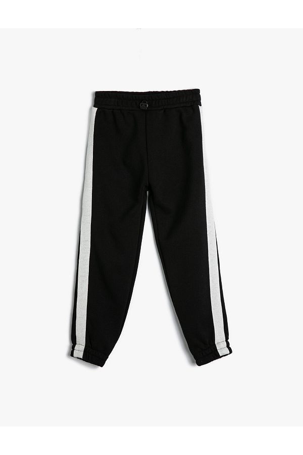 Koton-Basic-Jogger-Jogginghose mit Taschendetail und elastischem Bund. Basic-Jogger-Jogginghose mit Schleife 1