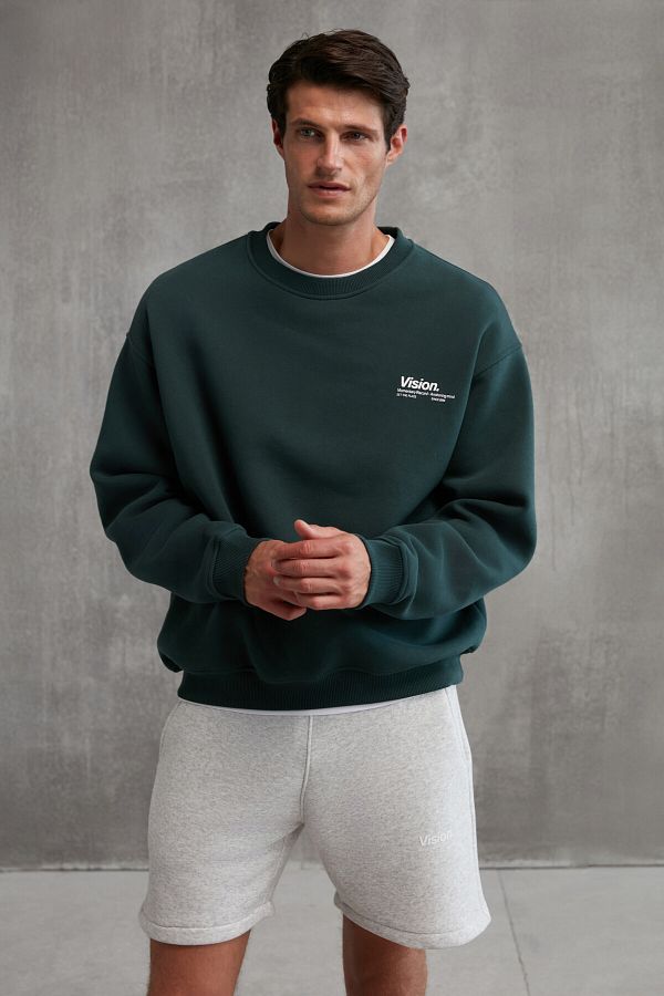 GRIMELANGE-Ernest Herren-Sweatshirt aus weicher Bio-Baumwolle mit detailliertem Rundhalsausschnitt und Fleece-Innenseite in Dunkelgrün 1