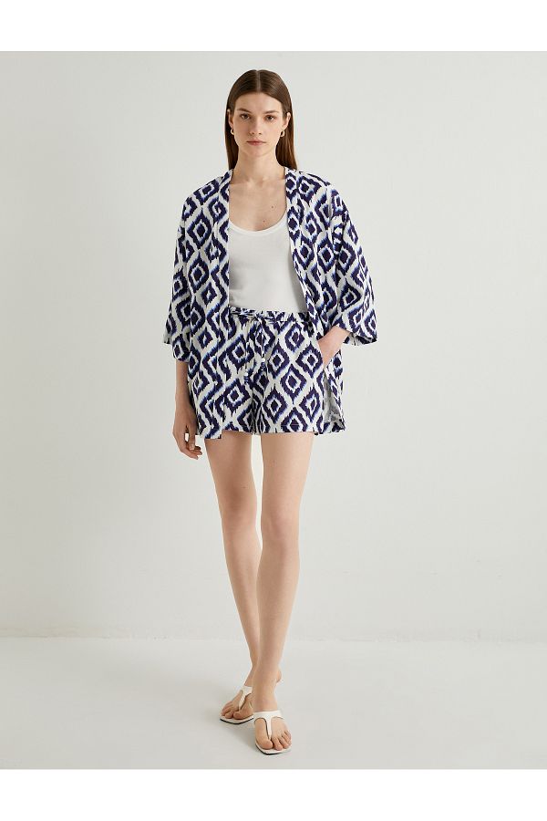 Koton-Mini-Shorts mit Schnürung in der Taille und Perlentaschen aus Viskose-Leinen-Mischgewebe 1
