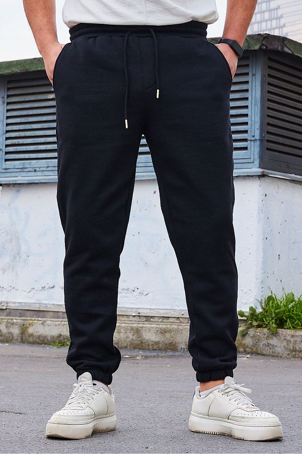 Trendyol Collection-Schwarze Fleece/warme Jogginghose – normaler Schnitt, elastisches Bein TMNAW22EA0346 1